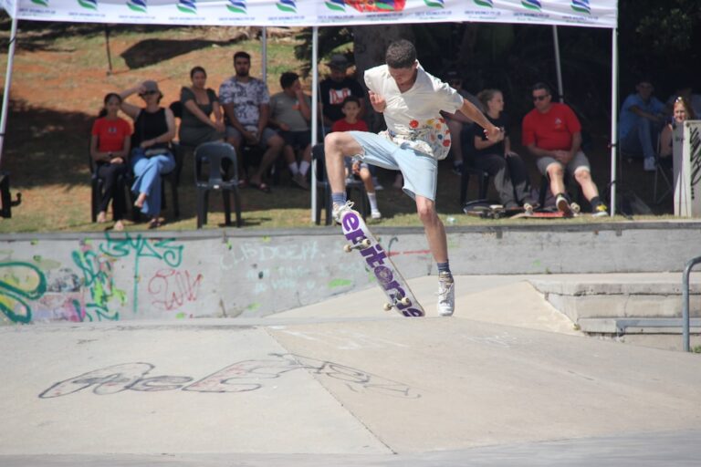 Young man performing a trick on a skateboard