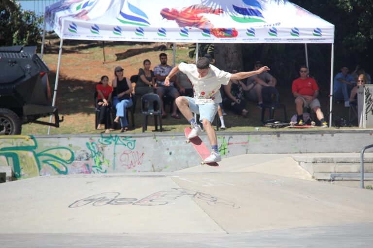 Skateboarder performing a trick in a skatepark