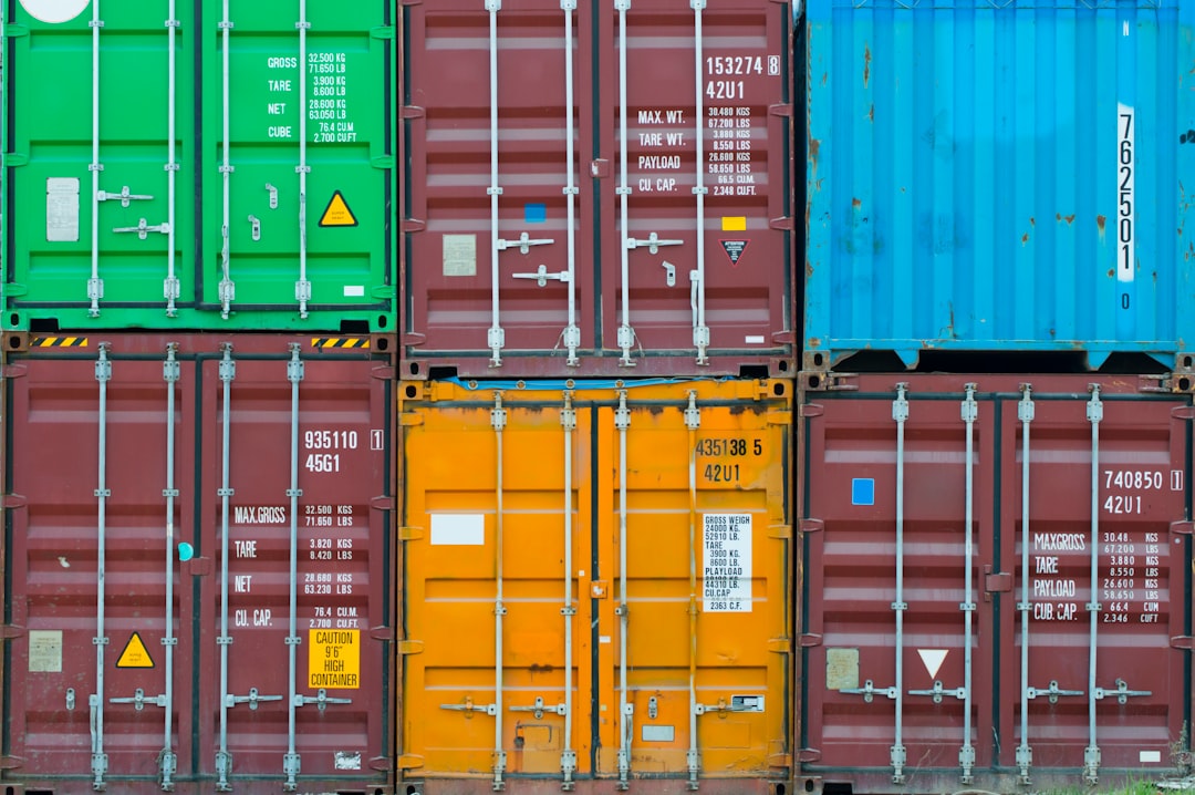 Stacked shipping containers in various colors