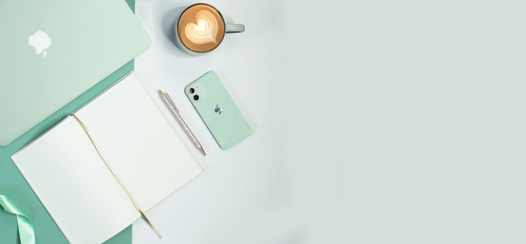 white ceramic mug on white table