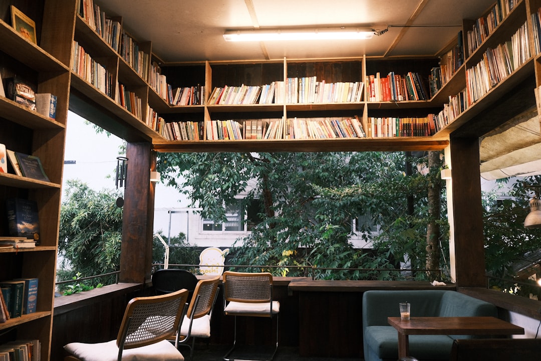 Cozy reading nook with bookshelves and chairs