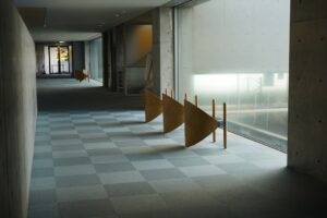 Modern hallway with geometric art installations