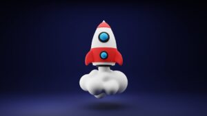 a red and white toy rocket on a blue background