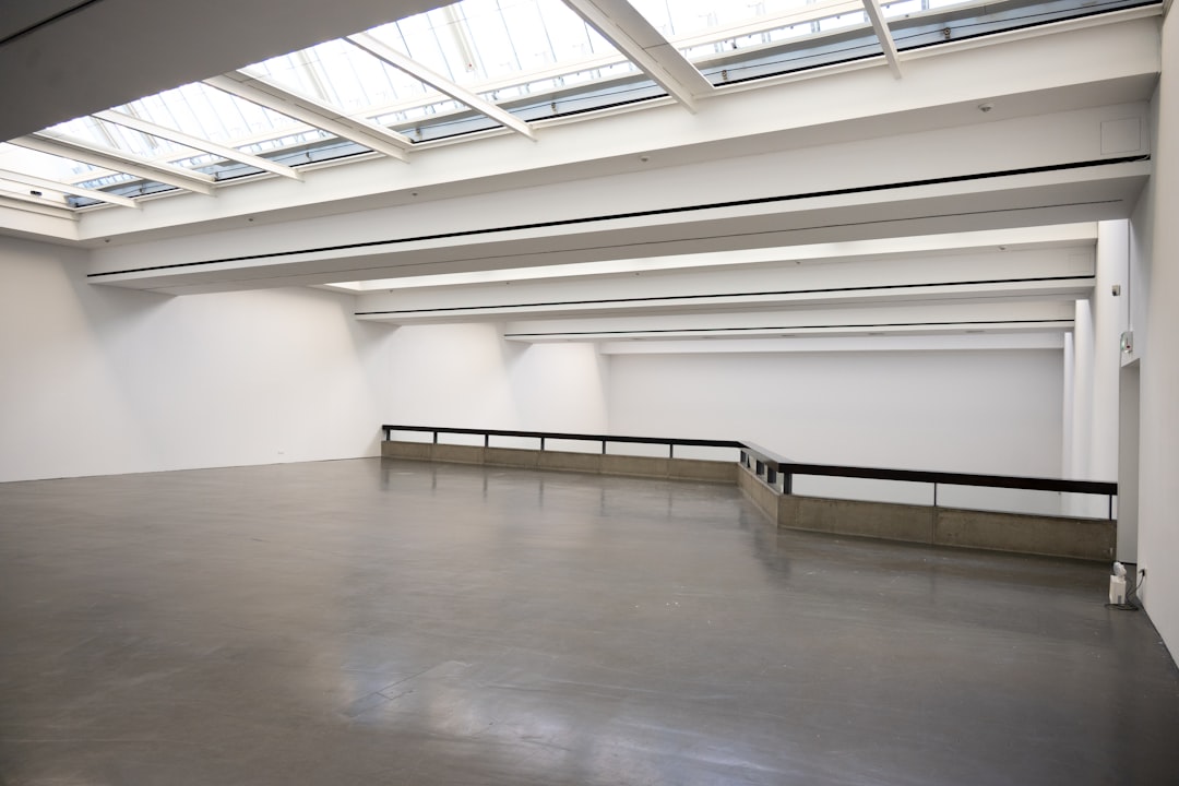 Modern art gallery interior with high ceilings and skylights