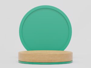 a green plate on a wooden stand on a white background