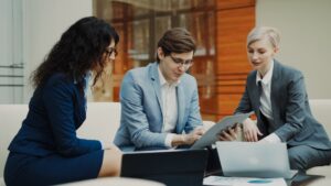 Three business people collaborating on a project