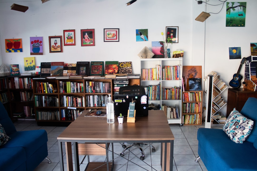 Cozy bookstore interior with bookshelves and seating.