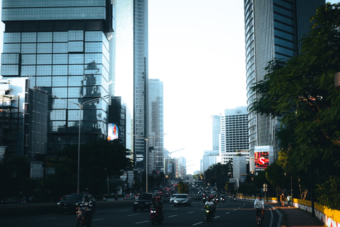 a city street filled with lots of tall buildings