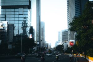a city street filled with lots of tall buildings