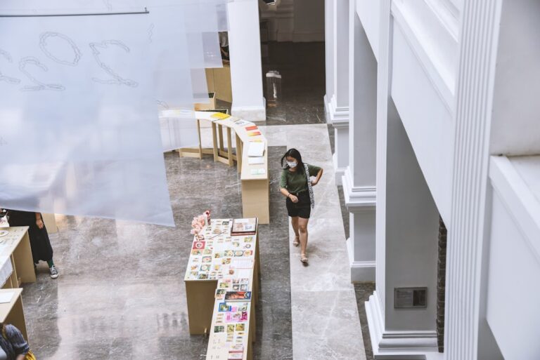 a man walking down a hallway
