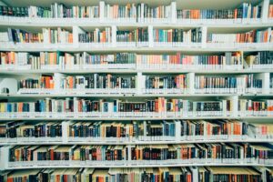pile of books on shelf