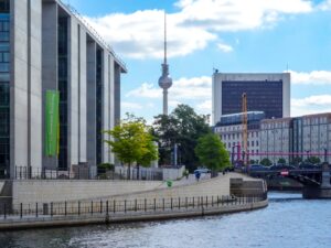 Berlin cityscape with television tower and river.