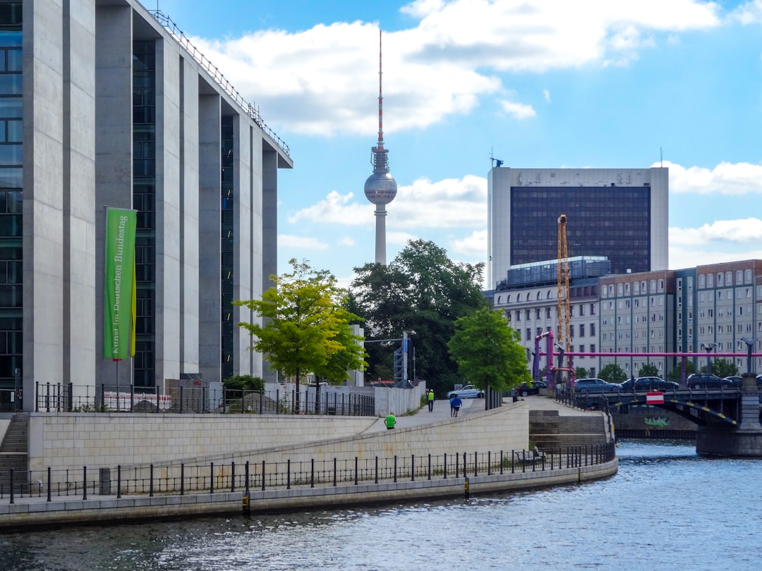 Berlin cityscape with television tower and river.
