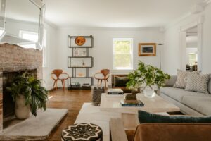 Elegant living room featuring a fireplace, sofa, and decorative accents.